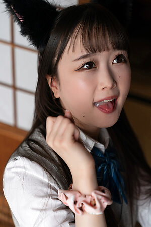 Japanese girl Ria Kurumi with cat ears sucks cock