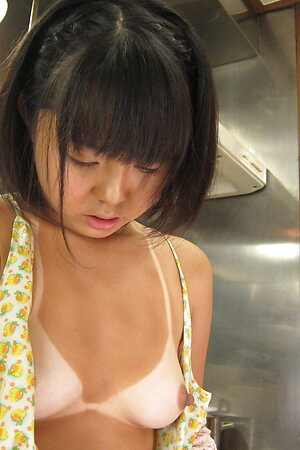 Tan line girl Tomoyo Isumi pleasures and then sucks a hard cock
