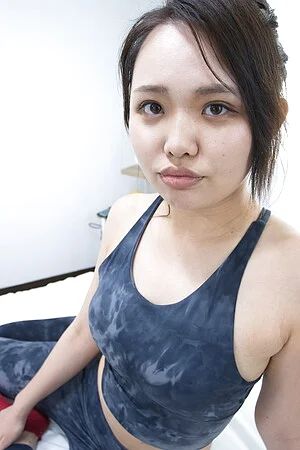 Yoga teacher Hina Chinen spreads her shaved pussy
